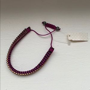 purple and gold bracelet
